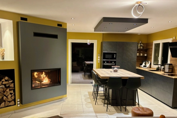 Installation d’une cheminée bois à foyer horizontal à Feuguerolles-Bully