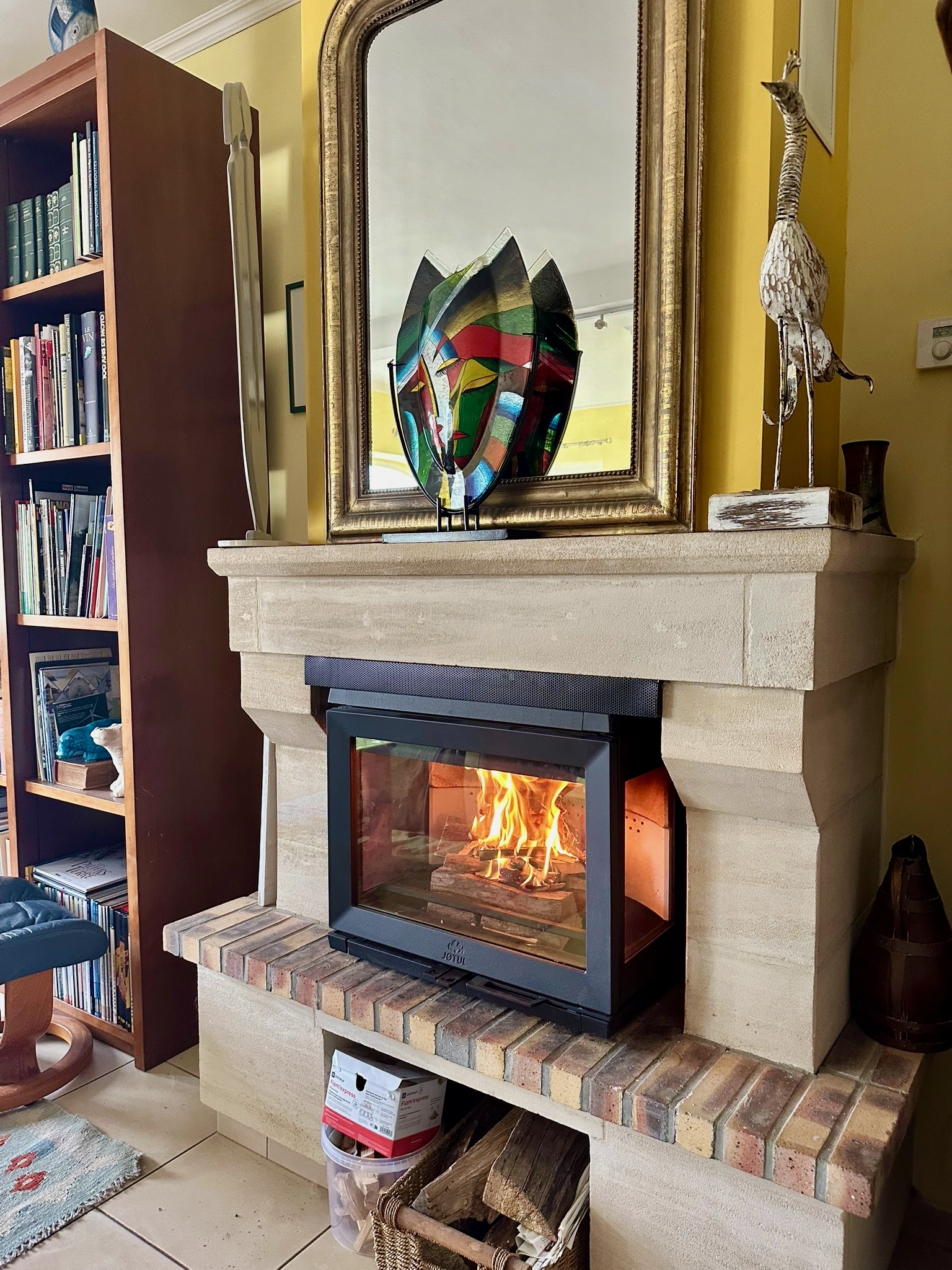 Pose d’un insert bois Jotul dans la côte de nacre.
